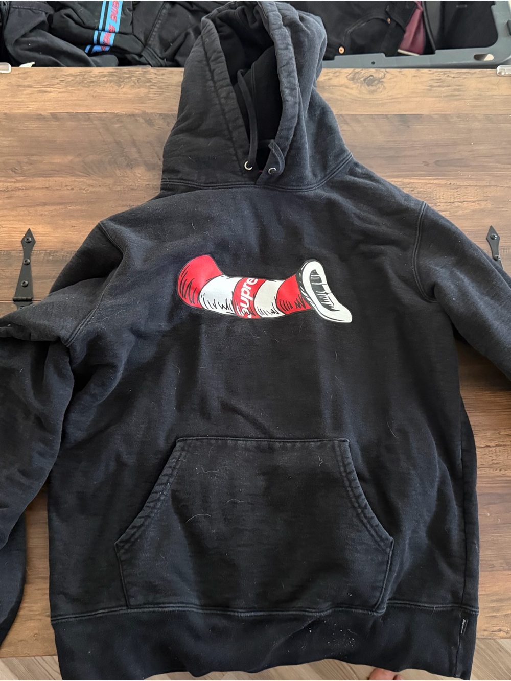 Supreme Black Hoodie with Red Tag